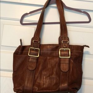 Gently used soft brown leather bag